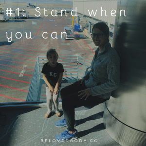 Woman and girl doing wall sit