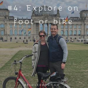 Woman and man standing in front of bike